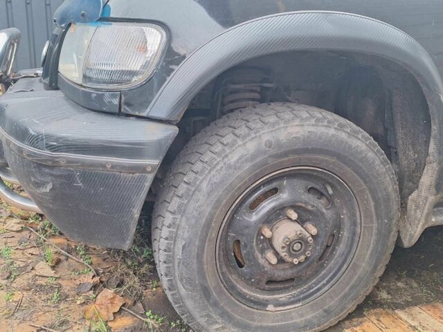 Черный Киа Sportage, объемом двигателя 2 л и пробегом 220 тыс. км за 2000 $, фото 7 на Automoto.ua