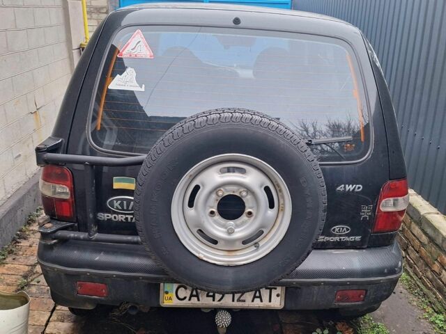 Черный Киа Sportage, объемом двигателя 2 л и пробегом 220 тыс. км за 2000 $, фото 3 на Automoto.ua