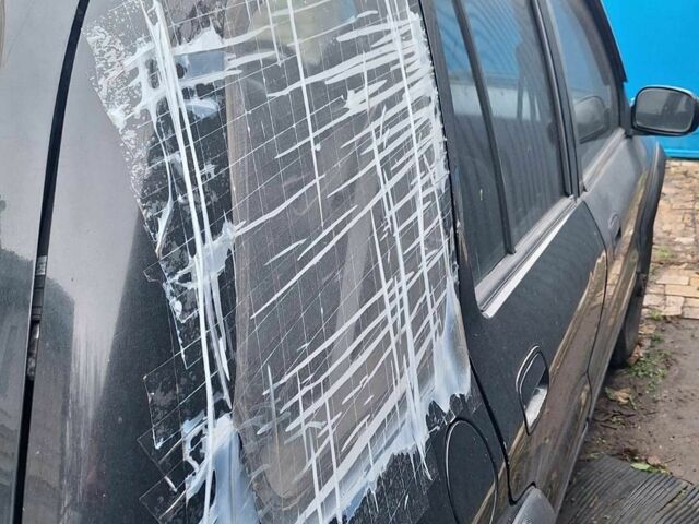 Черный Киа Sportage, объемом двигателя 2 л и пробегом 220 тыс. км за 2000 $, фото 4 на Automoto.ua