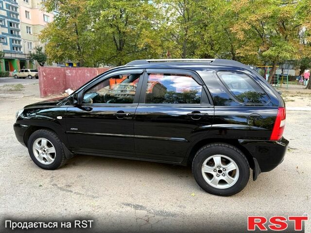 Черный Киа Sportage, объемом двигателя 2 л и пробегом 205 тыс. км за 7500 $, фото 1 на Automoto.ua