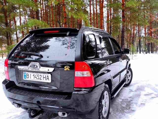 Черный Киа Sportage, объемом двигателя 2 л и пробегом 265 тыс. км за 9400 $, фото 11 на Automoto.ua