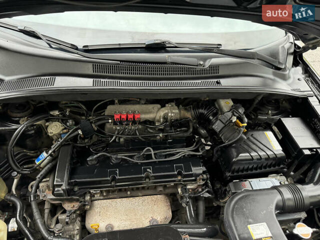 Черный Киа Sportage, объемом двигателя 2 л и пробегом 370 тыс. км за 6500 $, фото 19 на Automoto.ua