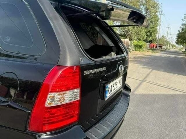 Черный Киа Sportage, объемом двигателя 2 л и пробегом 199 тыс. км за 6999 $, фото 3 на Automoto.ua