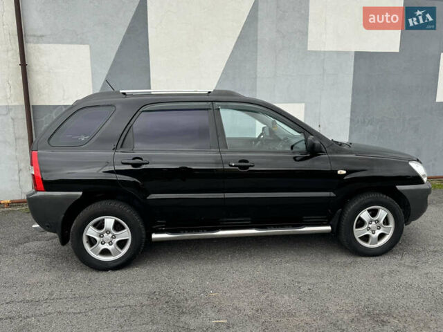 Черный Киа Sportage, объемом двигателя 2 л и пробегом 370 тыс. км за 6500 $, фото 7 на Automoto.ua