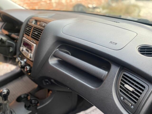 Черный Киа Sportage, объемом двигателя 2 л и пробегом 161 тыс. км за 4300 $, фото 14 на Automoto.ua