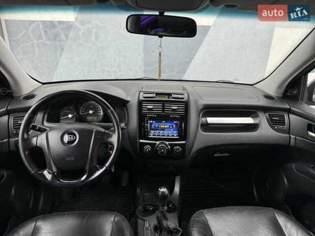 Черный Киа Sportage, объемом двигателя 2 л и пробегом 370 тыс. км за 6500 $, фото 16 на Automoto.ua