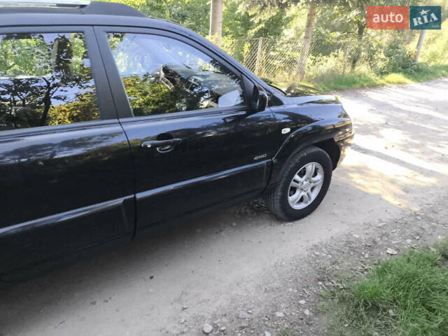 Черный Киа Sportage, объемом двигателя 1.99 л и пробегом 207 тыс. км за 7450 $, фото 6 на Automoto.ua