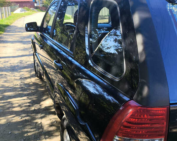 Черный Киа Sportage, объемом двигателя 1.99 л и пробегом 207 тыс. км за 7450 $, фото 4 на Automoto.ua