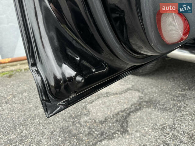 Черный Киа Sportage, объемом двигателя 2 л и пробегом 370 тыс. км за 6500 $, фото 24 на Automoto.ua