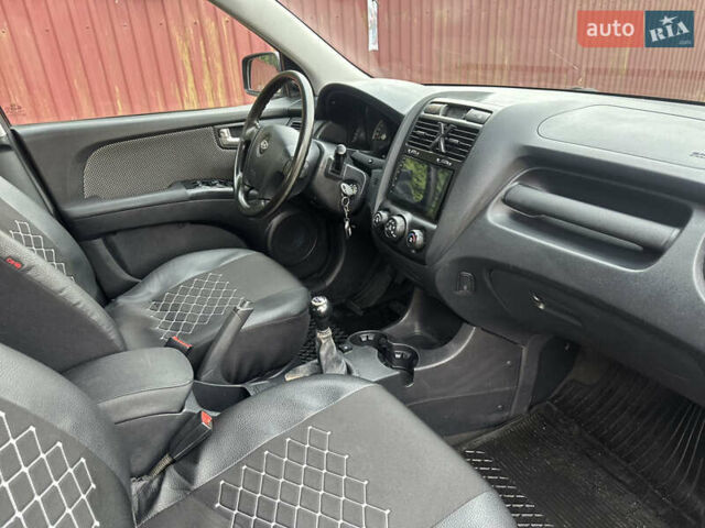 Черный Киа Sportage, объемом двигателя 1.98 л и пробегом 262 тыс. км за 5350 $, фото 18 на Automoto.ua