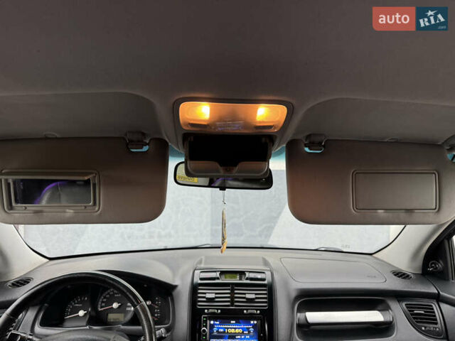 Черный Киа Sportage, объемом двигателя 2 л и пробегом 370 тыс. км за 6500 $, фото 17 на Automoto.ua