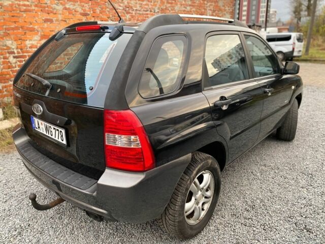 Черный Киа Sportage, объемом двигателя 2 л и пробегом 161 тыс. км за 4300 $, фото 3 на Automoto.ua