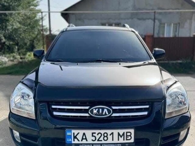 Черный Киа Sportage, объемом двигателя 2 л и пробегом 199 тыс. км за 6999 $, фото 1 на Automoto.ua