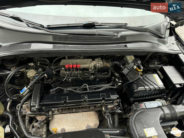 Черный Киа Sportage, объемом двигателя 2 л и пробегом 370 тыс. км за 6500 $, фото 20 на Automoto.ua