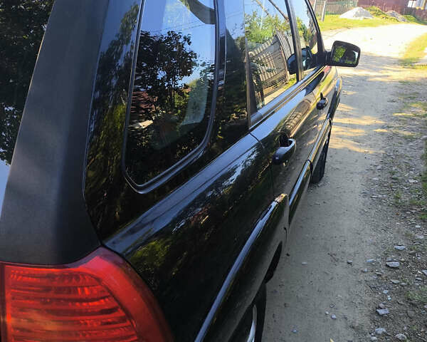 Черный Киа Sportage, объемом двигателя 1.99 л и пробегом 207 тыс. км за 7450 $, фото 7 на Automoto.ua