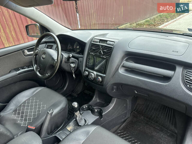 Черный Киа Sportage, объемом двигателя 1.98 л и пробегом 262 тыс. км за 5350 $, фото 17 на Automoto.ua