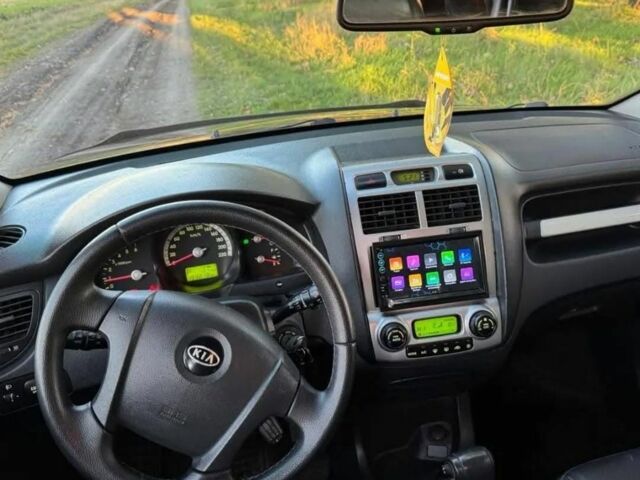 Черный Киа Sportage, объемом двигателя 2 л и пробегом 199 тыс. км за 6999 $, фото 7 на Automoto.ua