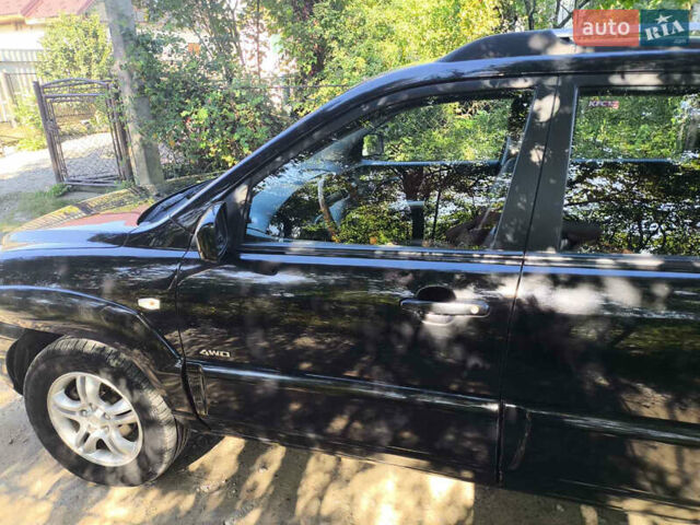 Черный Киа Sportage, объемом двигателя 1.99 л и пробегом 207 тыс. км за 7450 $, фото 5 на Automoto.ua