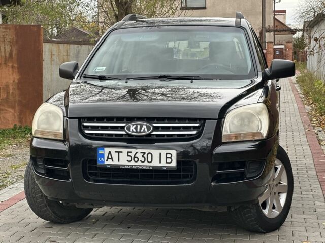 Черный Киа Sportage, объемом двигателя 2 л и пробегом 262 тыс. км за 5350 $, фото 2 на Automoto.ua