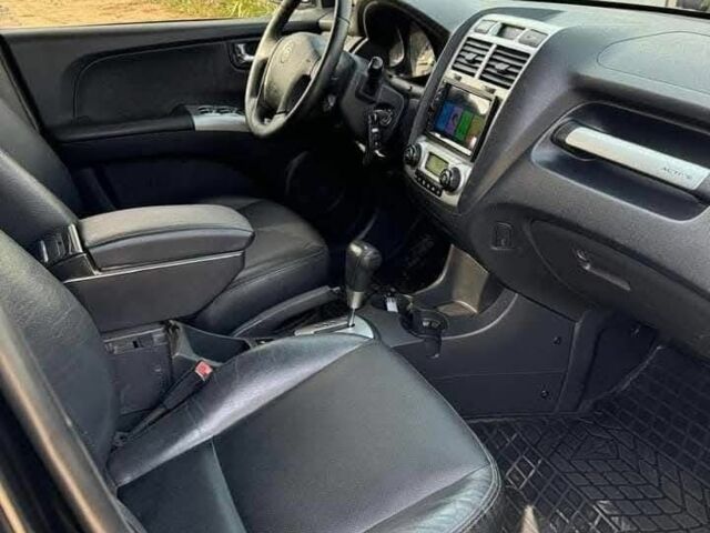 Черный Киа Sportage, объемом двигателя 2 л и пробегом 199 тыс. км за 6999 $, фото 5 на Automoto.ua