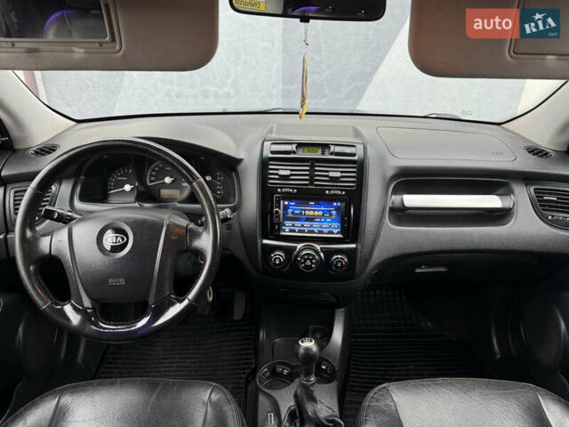 Черный Киа Sportage, объемом двигателя 2 л и пробегом 370 тыс. км за 6500 $, фото 18 на Automoto.ua