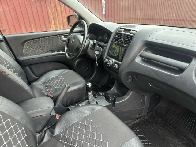 Черный Киа Sportage, объемом двигателя 2 л и пробегом 262 тыс. км за 5350 $, фото 17 на Automoto.ua