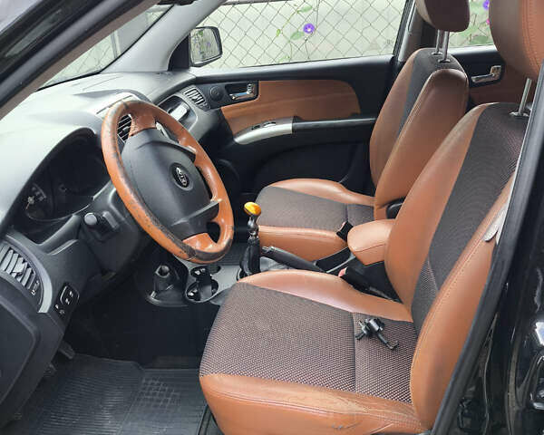 Черный Киа Sportage, объемом двигателя 1.99 л и пробегом 207 тыс. км за 7450 $, фото 9 на Automoto.ua
