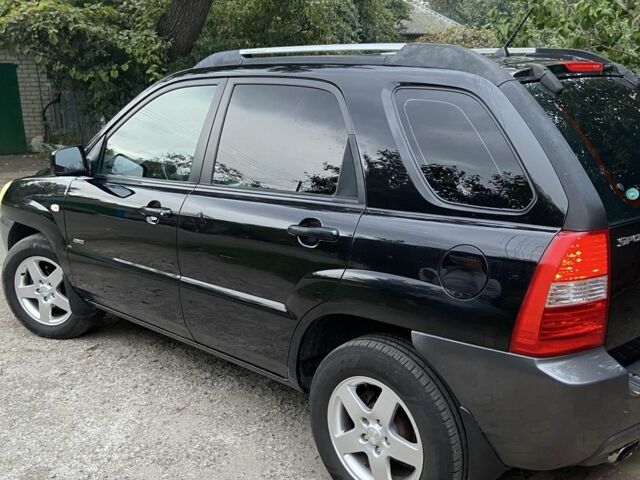 Чорний Кіа Sportage, об'ємом двигуна 2 л та пробігом 227 тис. км за 6900 $, фото 6 на Automoto.ua