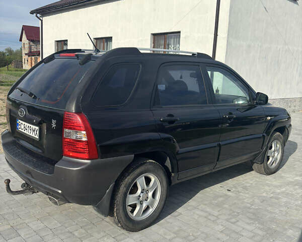Черный Киа Sportage, объемом двигателя 2 л и пробегом 300 тыс. км за 6800 $, фото 4 на Automoto.ua