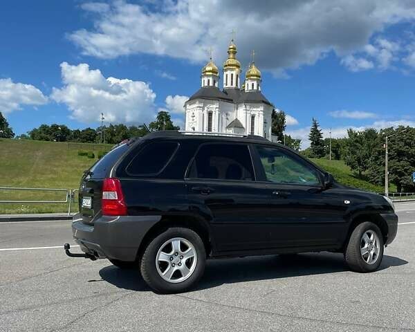 Чорний Кіа Sportage, об'ємом двигуна 1.98 л та пробігом 200 тис. км за 7900 $, фото 19 на Automoto.ua