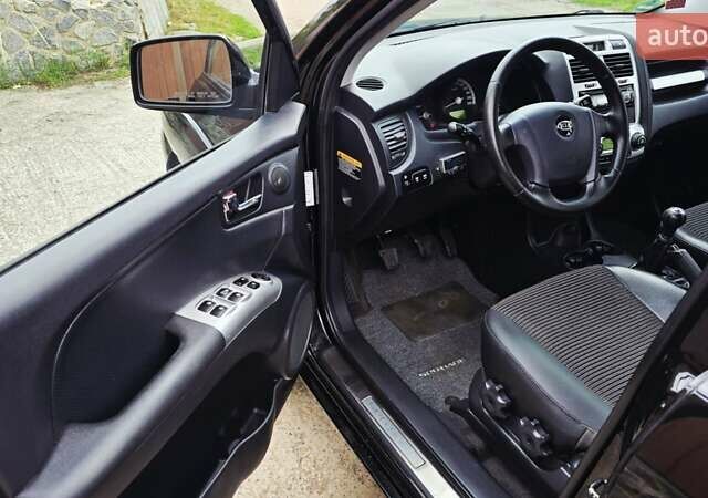 Чорний Кіа Sportage, об'ємом двигуна 2 л та пробігом 172 тис. км за 7999 $, фото 39 на Automoto.ua
