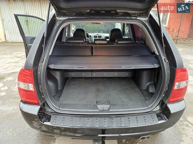 Черный Киа Sportage, объемом двигателя 2 л и пробегом 160 тыс. км за 7777 $, фото 25 на Automoto.ua