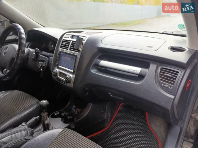 Чорний Кіа Sportage, об'ємом двигуна 1.98 л та пробігом 232 тис. км за 7900 $, фото 12 на Automoto.ua