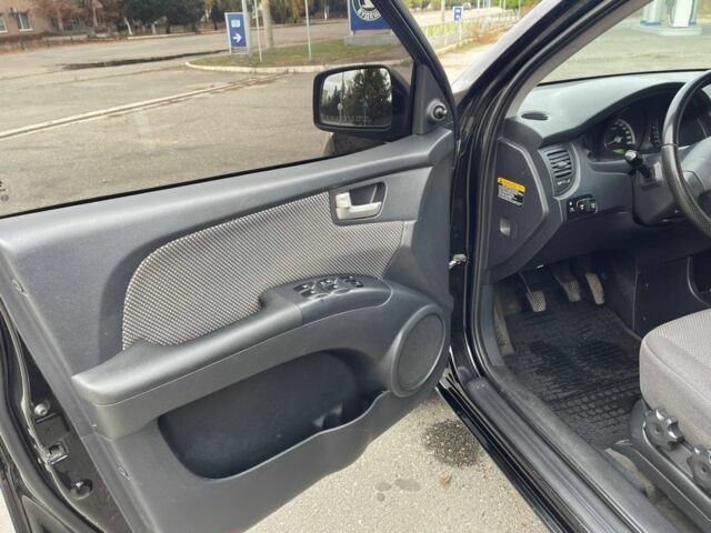 Черный Киа Sportage, объемом двигателя 2 л и пробегом 202 тыс. км за 6500 $, фото 6 на Automoto.ua