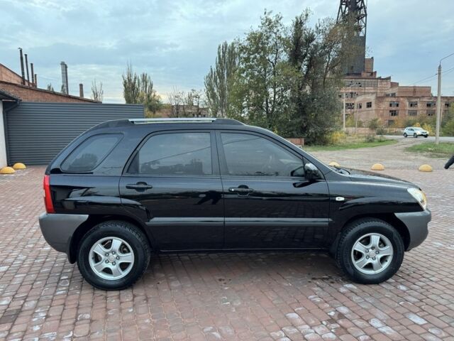 Чорний Кіа Sportage, об'ємом двигуна 2 л та пробігом 180 тис. км за 6700 $, фото 5 на Automoto.ua