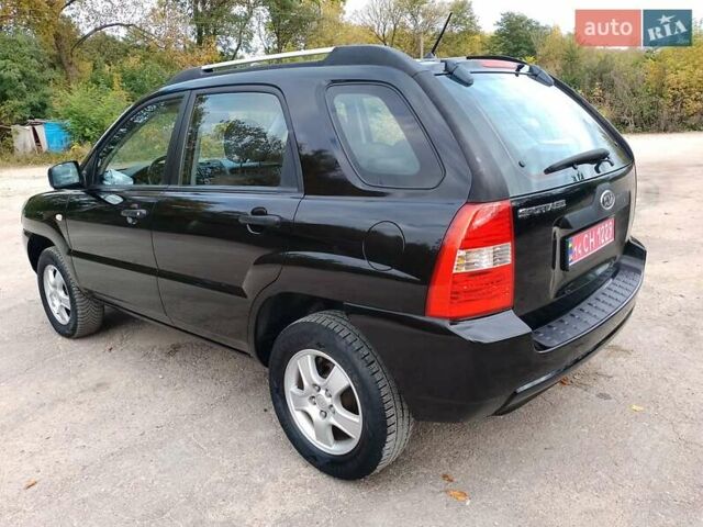 Чорний Кіа Sportage, об'ємом двигуна 2 л та пробігом 150 тис. км за 7000 $, фото 13 на Automoto.ua