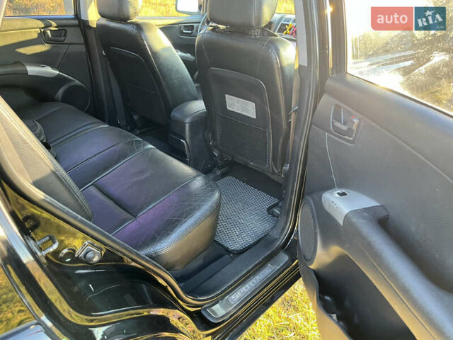 Чорний Кіа Sportage, об'ємом двигуна 1.99 л та пробігом 281 тис. км за 7600 $, фото 9 на Automoto.ua