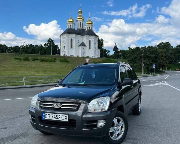 Чорний Кіа Sportage, об'ємом двигуна 1.98 л та пробігом 200 тис. км за 7900 $, фото 1 на Automoto.ua