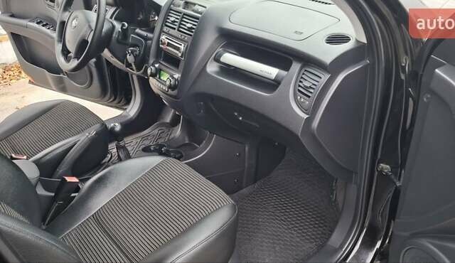 Черный Киа Sportage, объемом двигателя 2 л и пробегом 170 тыс. км за 8700 $, фото 20 на Automoto.ua