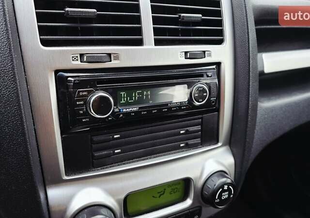 Чорний Кіа Sportage, об'ємом двигуна 2 л та пробігом 172 тис. км за 7999 $, фото 44 на Automoto.ua