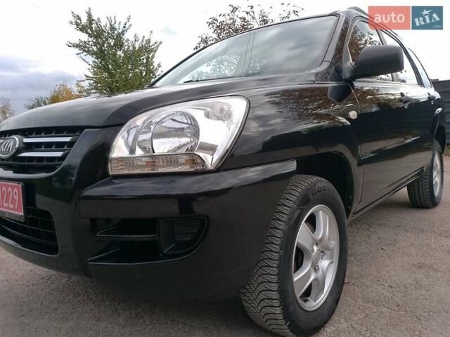 Чорний Кіа Sportage, об'ємом двигуна 2 л та пробігом 150 тис. км за 7000 $, фото 23 на Automoto.ua