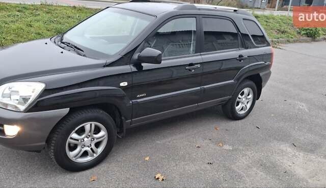 Черный Киа Sportage, объемом двигателя 2 л и пробегом 170 тыс. км за 8700 $, фото 3 на Automoto.ua