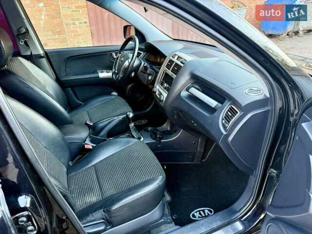 Черный Киа Sportage, объемом двигателя 2 л и пробегом 159 тыс. км за 7650 $, фото 15 на Automoto.ua