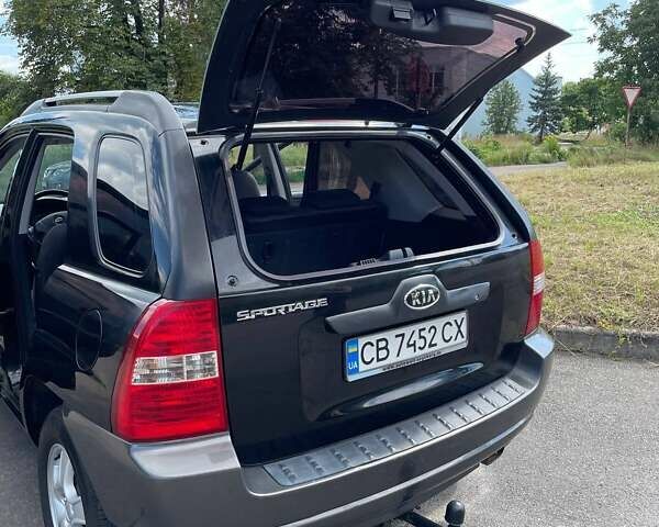 Чорний Кіа Sportage, об'ємом двигуна 1.98 л та пробігом 200 тис. км за 7900 $, фото 9 на Automoto.ua