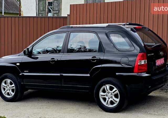 Чорний Кіа Sportage, об'ємом двигуна 2 л та пробігом 172 тис. км за 7999 $, фото 27 на Automoto.ua