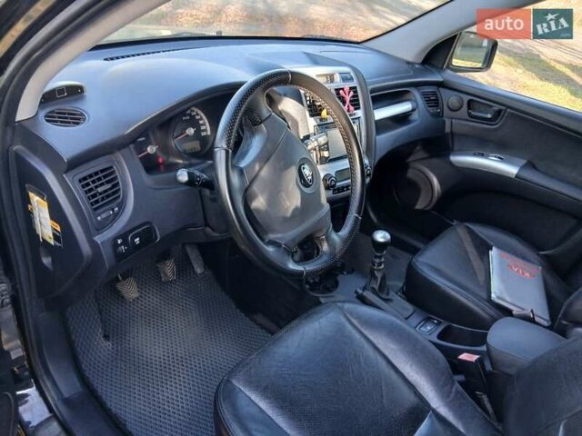 Черный Киа Sportage, объемом двигателя 1.99 л и пробегом 281 тыс. км за 6800 $, фото 19 на Automoto.ua