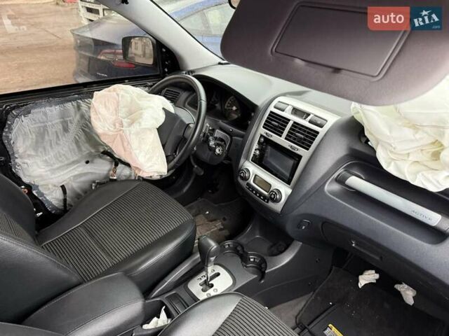 Черный Киа Sportage, объемом двигателя 1.99 л и пробегом 219 тыс. км за 3300 $, фото 14 на Automoto.ua