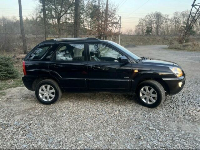 Чорний Кіа Sportage, об'ємом двигуна 2 л та пробігом 200 тис. км за 3950 $, фото 2 на Automoto.ua