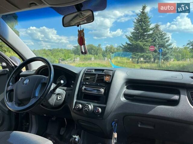Чорний Кіа Sportage, об'ємом двигуна 1.98 л та пробігом 200 тис. км за 7900 $, фото 12 на Automoto.ua