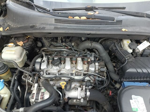 Черный Киа Sportage, объемом двигателя 2 л и пробегом 307 тыс. км за 4800 $, фото 7 на Automoto.ua